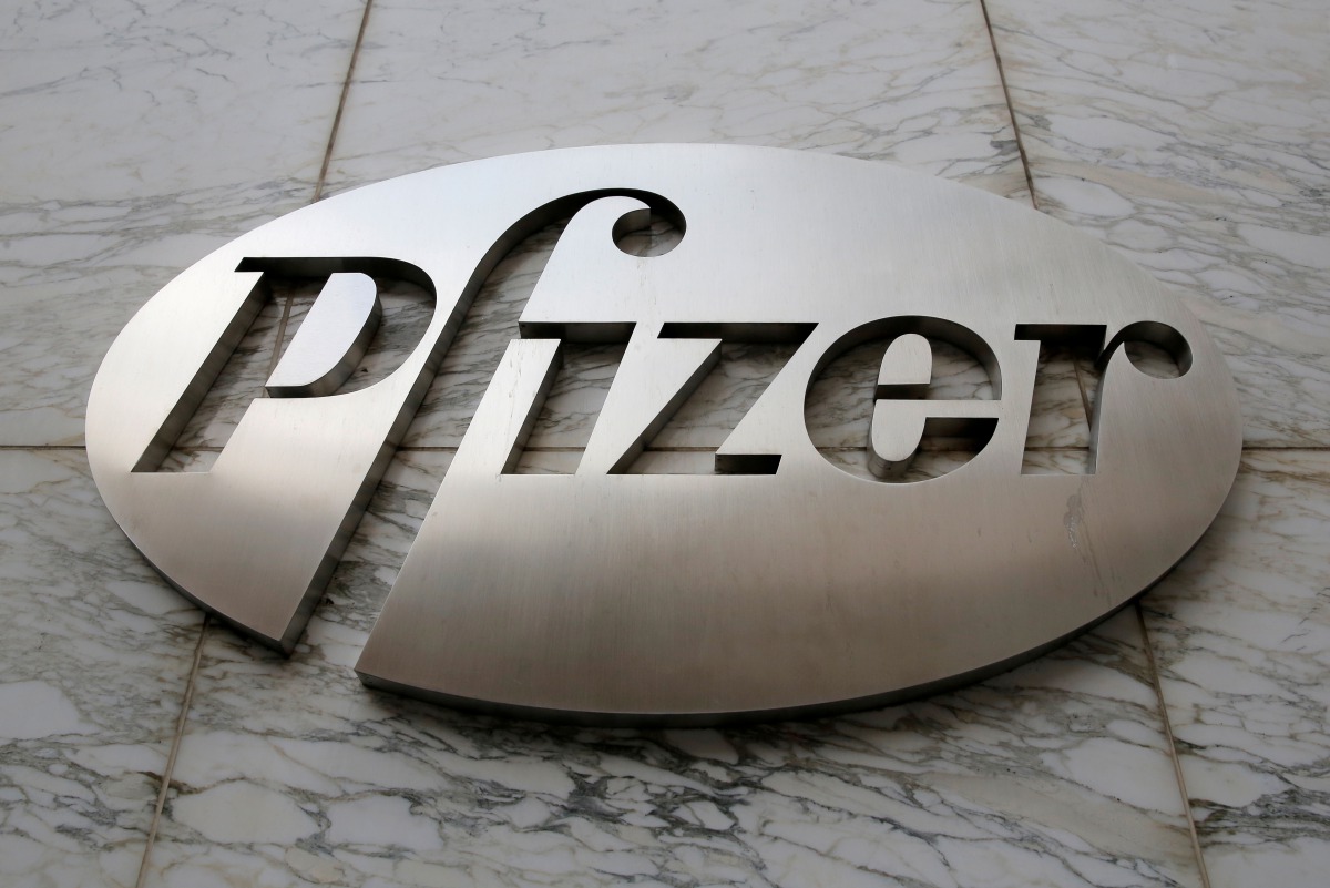 FILE PHOTO: The Pfizer logo is seen at their world headquarters in Manhattan, New York, U.S., August 1, 2016. REUTERS/Andrew Kelly/File Photo
