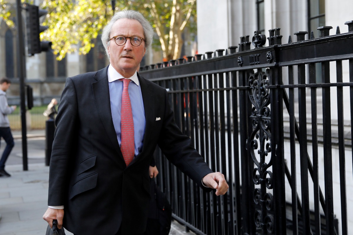 (FILES) In this file photo taken on September 19, 2019 Advocate General for Scotland Richard Keen arrives at the Supreme court in central London on the third and final day of the hearing into the decision by Britain's government to prorogue parliament. Ri