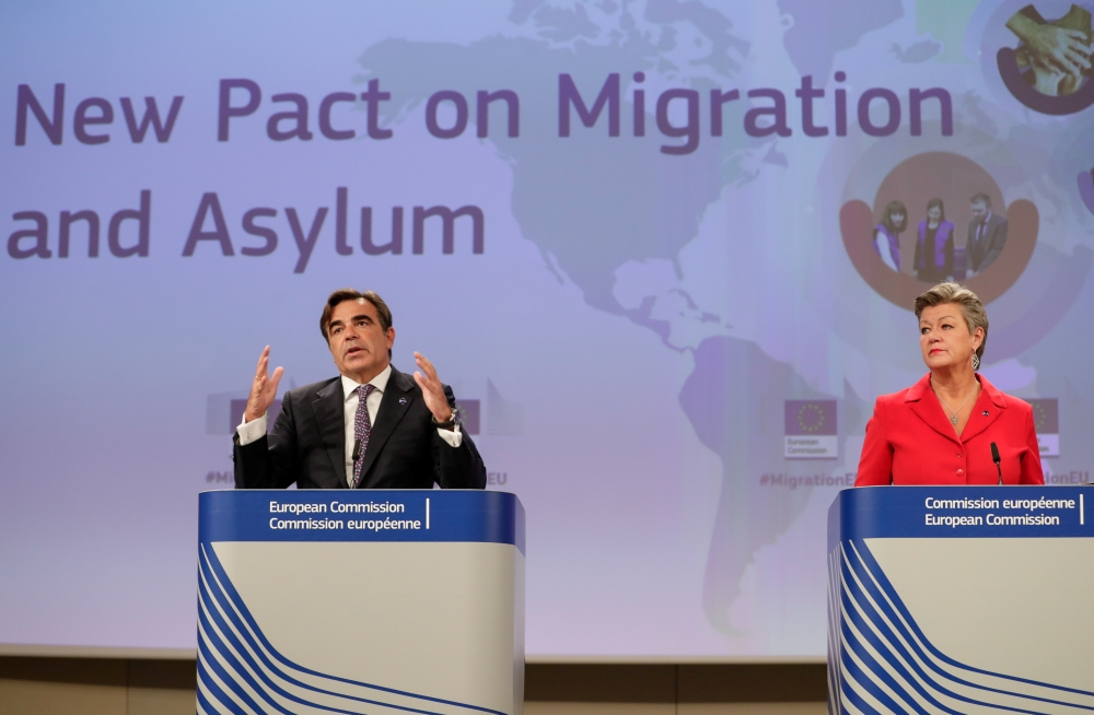 European Commissioner for Promoting our European Way of Life Margaritis Schinas and European Home Affairs Commissioner Ylva Johansson attends a news conference on New Pact for Migration and Asylum after the college of EU commissioners in Brussels, Belgium