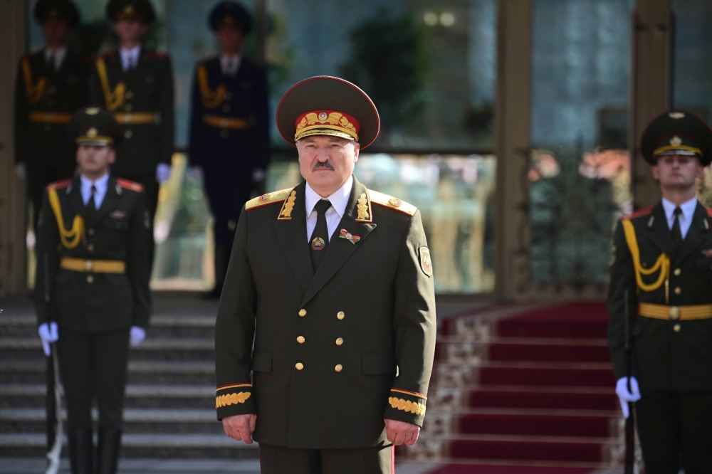 Belarusian President Alexander Lukashenko stands near service members during an inauguration ceremony in Minsk, Belarus September 23, 2020. Andrei Stasevich