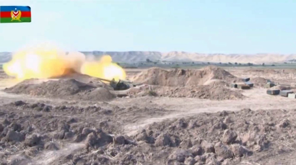 An image grab taken from a video made available on the official web site of the Azerbaijani Defence Ministry on September 28, 2020, showing a combat operation during clashes between Armenian separatists and Azerbaijan in the breakaway region of Nagorno-Ka