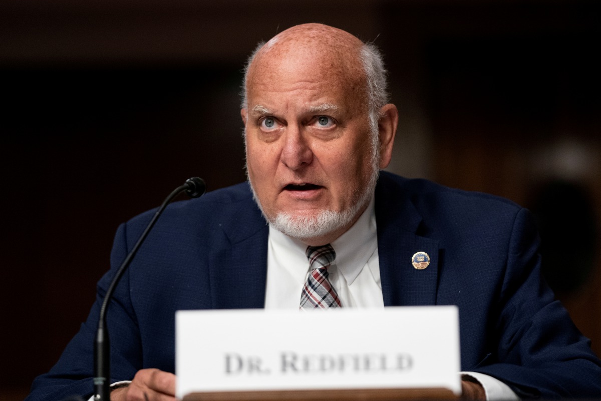 FILE PHOTO: Robert Redfield, MD, Director, United States Centers for Disease Control and Prevention, testifies during a U.S. Senate Senate Health, Education, Labor, and Pensions Committee Hearing to examine COVID-19, focusing on an update on the federal r