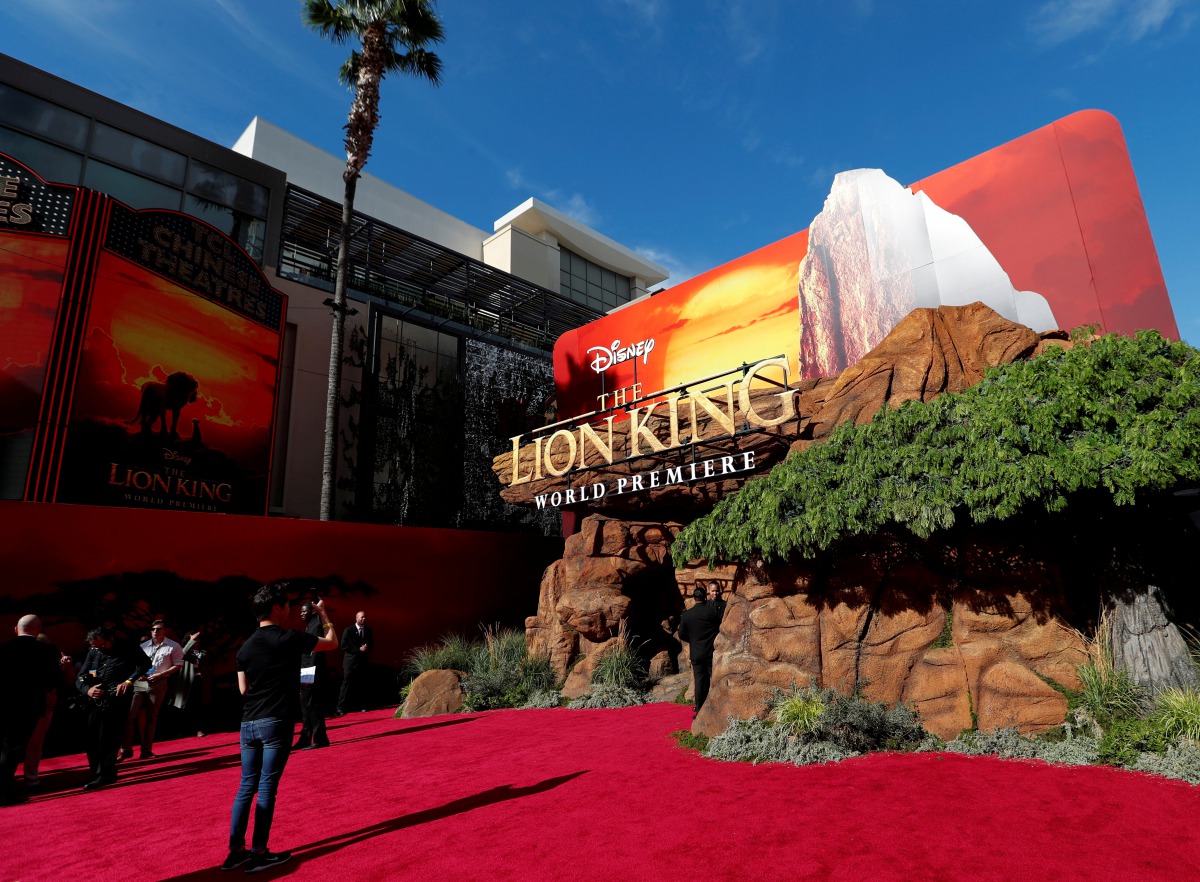 FILE PHOTO: A person takes pictures ahead of the World Premiere of 
