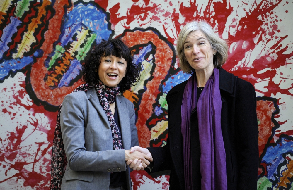 French microbiologist Emmanuelle Charpentier (L) and professor Jennifer Doudna of the U.S. pose for the media during a visit to a painting exhibition by children about the genome, at the San Francisco park in Oviedo, SPAIN, October 21, 2015. REUTERS/Eloy 