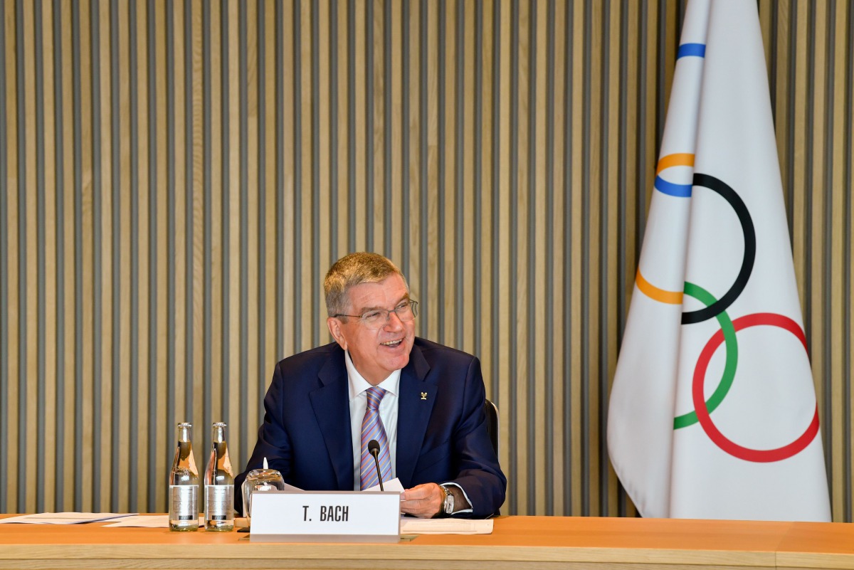 This handout picture taken and released by the Information Services of the International Olympic Committee (IOC) on October 7, 2020, shows IOC President Thomas Bach holding an executive board meeting at the IOC headquarters in Lausanne./ AFP / OIS/IOC / O