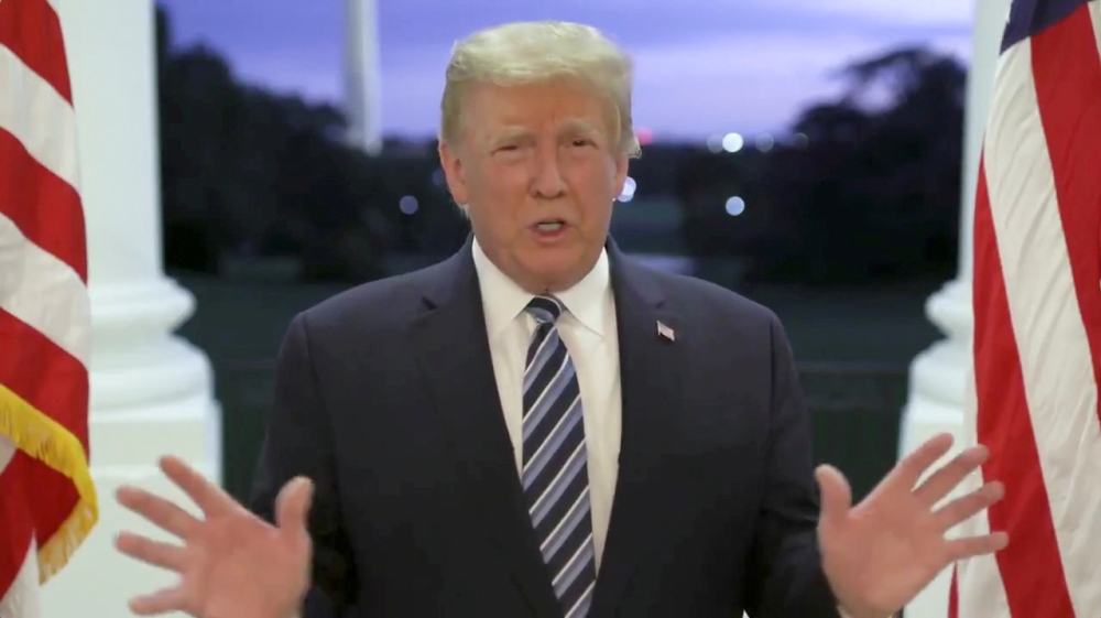 U.S. President Donald Trump speaks at the White House after returning from hospitalization at the Walter Reed Medical Center for coronavirus disease (COVID-19) treatment, in Washington, October 5, 2020, in this still image from video posted on Trump's Twi