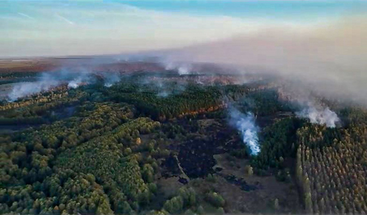 This handout picture taken and released by the Russian Emergencies Ministry on October 8, 2020 shows smoke rising from a fire at a munitions depot in the Ryazan region.AFP PHOTO / Russian Emergencies Ministry / handout 