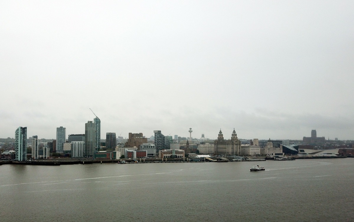 An aerial picture shows a ferry crossing the River Mersey in Liverpool on October 12, 2020, as the government is expected to announce further lockdown restrictions today as COVID-19 infection rates rocket across the northwest of England. / AFP / Paul ELLI