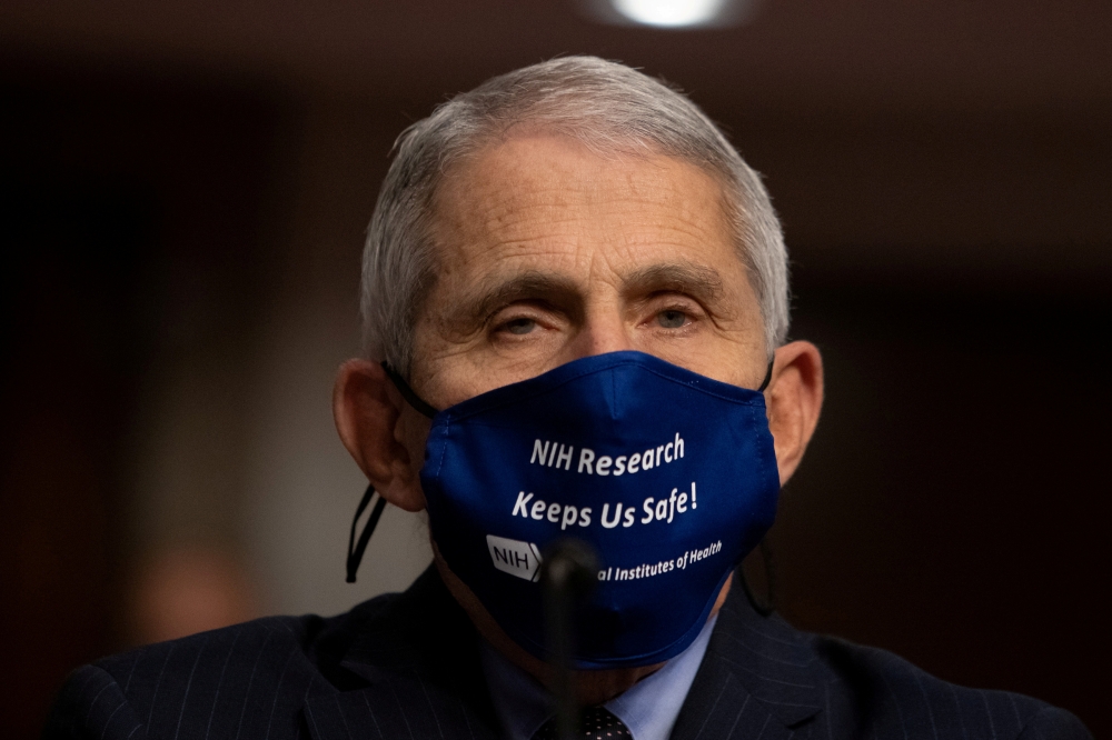 FILE PHOTO: Anthony Fauci, MD, Director, National Institute of Allergy and Infectious Diseases, National Institutes of Health, looks on before testifying at a U.S. Senate Senate Health, Education, Labor, and Pensions Committee Hearing to examine COVID-19,
