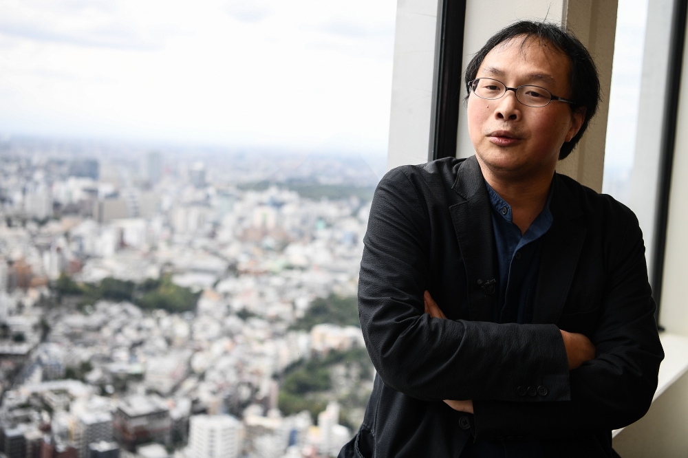 This photograph taken on September 29, 2020 shows Japanese film director Koji Fukada posing for AFP in Tokyo. AFP / Charly Triballeau  