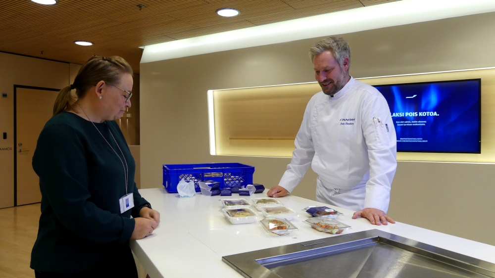 Marika Nieminen, Head of Finnair kitchen and Juha Stenholm, Finnair Kitchen Chief are pictured in Vantaa, Finland, October 22, 2020. Picture taken October 22, 2020. REUTERS/Attila Cser