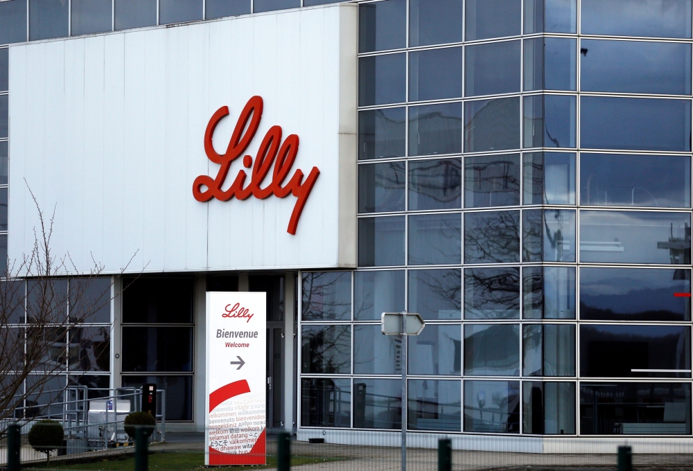 The logo of Lilly is seen on a wall of the Lilly France company unit, part of the Eli Lilly and Co drugmaker group, in Fegersheim near Strasbourg, France, February 1, 2018. REUTERS/Vincent Kessler/File Photo