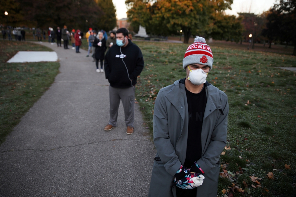 Voters line up at a polling station during the election in Columbus, Ohio, U.S. November 3, 2020. REUTERS/Megan Jelinger TPX IMAGES OF THE DAY