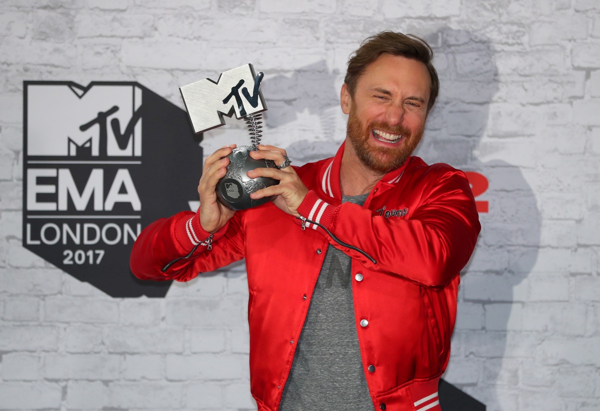 FILE PHOTO: French DJ David Guetta poses with his award during the 2017 MTV Europe Music Awards at Wembley Arena in London, Britain November 12, 2017. REUTERS//Hannah McKay/File Photo
