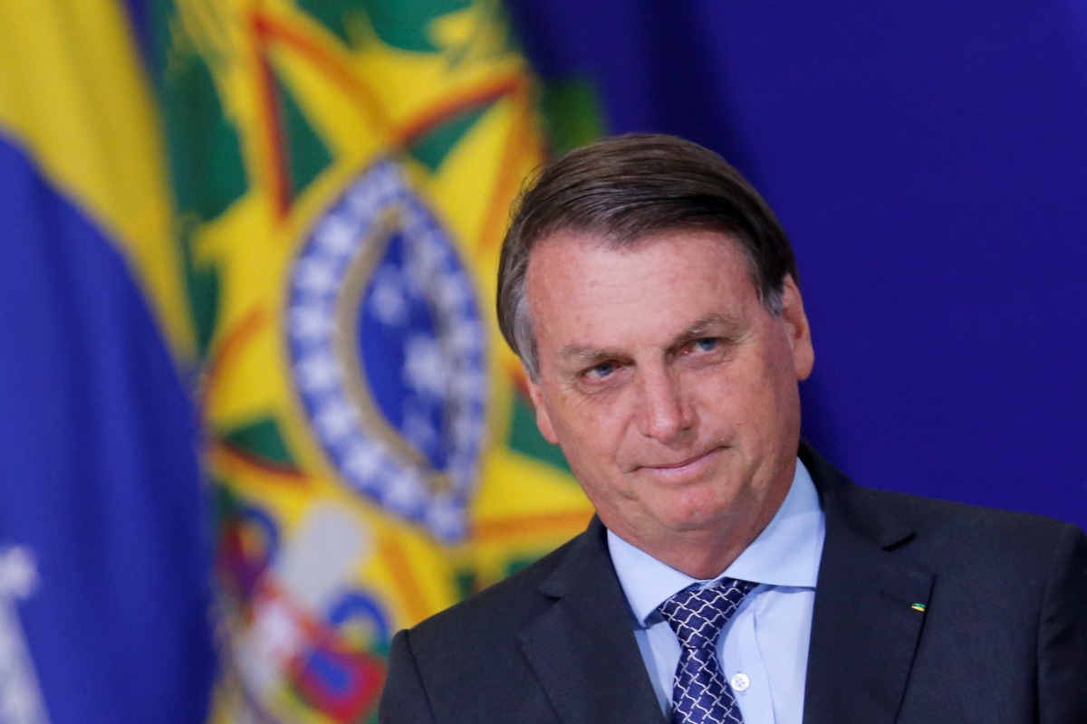 Brazil's President Jair Bolsonaro looks on during a ceremony at the Planalto Palace in Brasilia, Brazil November 9, 2020. REUTERS/Adriano Machado
