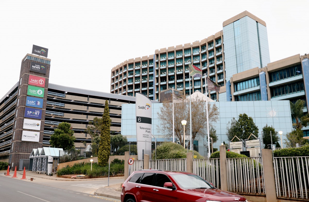 FILE PHOTO: A car drives past a building of one of the state-owned companies, the South African Broadcasting Corporation (SABC), amid a nationwide coronavirus disease (COVID-19) lockdown in Auckland Park, in Johannesburg, South Africa, September 1, 2020. 