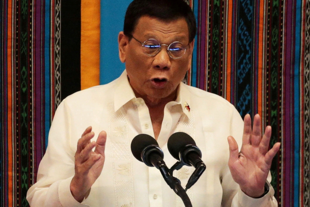 Philippine President Rodrigo Duterte gestures during his fourth State of the Nation Address at the Philippine Congress in Quezon City, Metro Manila, Philippines July 22, 2019. REUTERS/Eloisa Lopez/File Photo