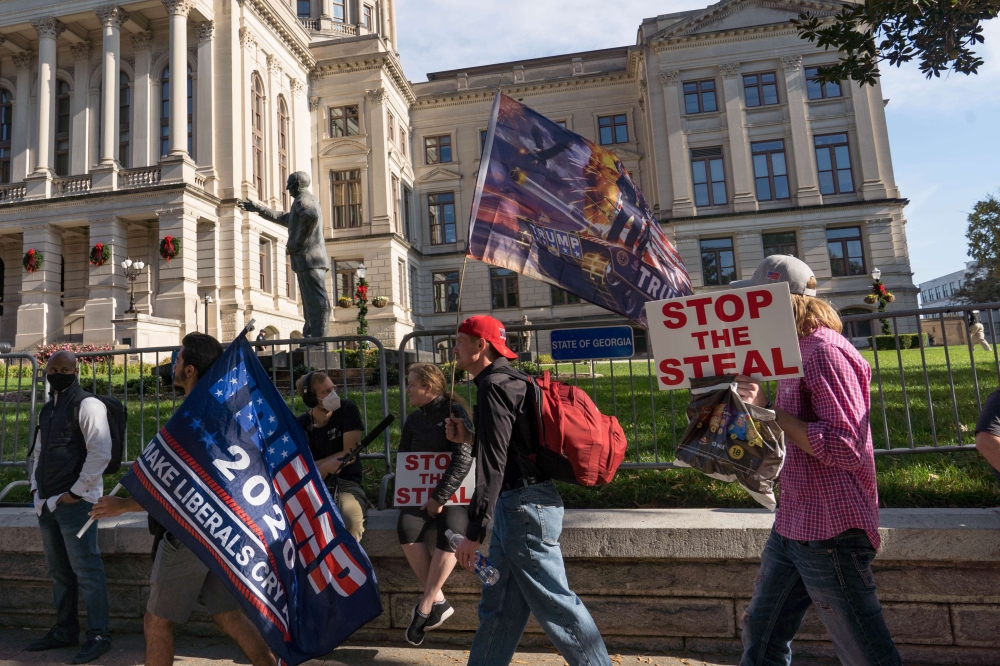 Supporters of Donald Trump host a 'Stop the Steal' protest outside of the Georgia State Capital building on November 21, 2020 in Atlanta, Georgia. Megan Varner/AFP