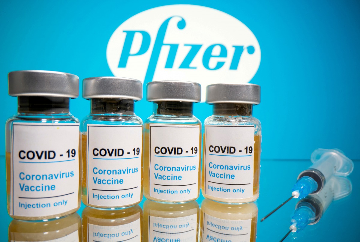 FILE PHOTO: FILE PHOTO: FILE PHOTO: FILE PHOTO: Vials with a sticker reading, 