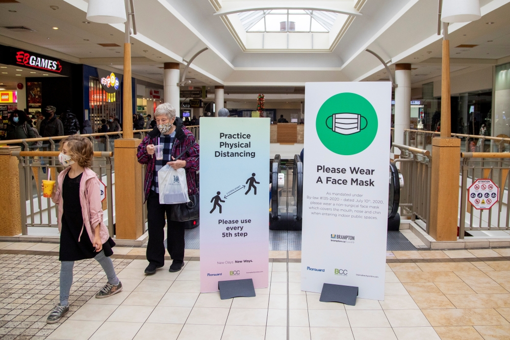 Shoppers walk in Bramalea City Centre mall in Brampton two days before COVID-19 restrictions are reintroduced to Greater Toronto Area regions in Ontario, Canada November 21, 2020. REUTERS/Carlos Osorio
