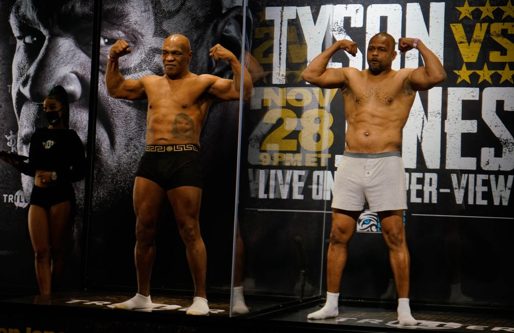Mike Tyson and Roy Jones, Jr. during weigh-ins for a heavyweight exhibition boxing bout for the WBC Frontline Belt in Los Angeles. Mandatory Credit: Lynn Millspaugh/Handout Photo via USA TODAY Sports
