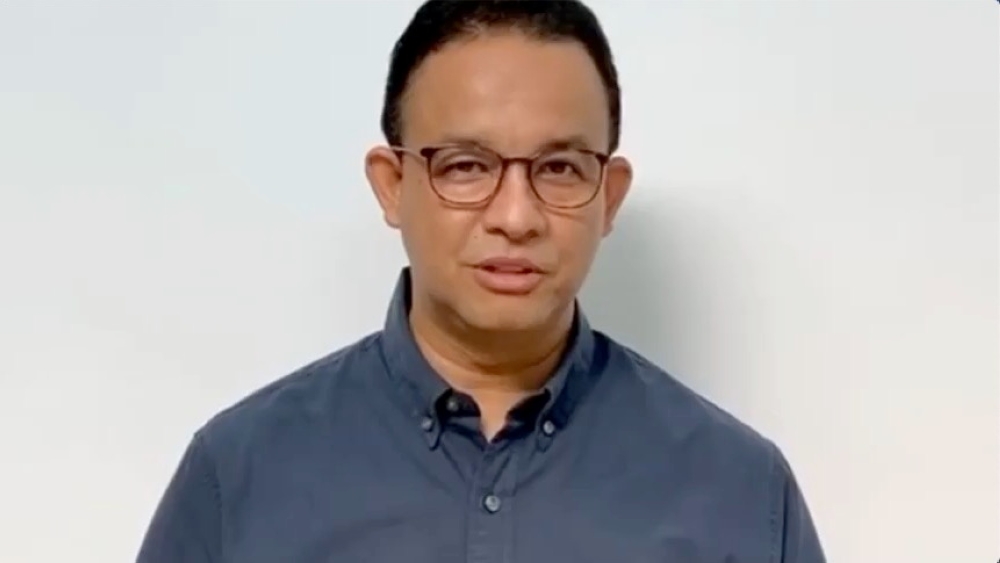 Jakarta Governor Anies Baswedan speaks in a video statement about testing positive for coronavirus disease (COVID-19) in this still frame obtained from social media video dated December 1, 2020, in Jakarta, Indonesia. Insta@aniesbaswedan via Reuters  