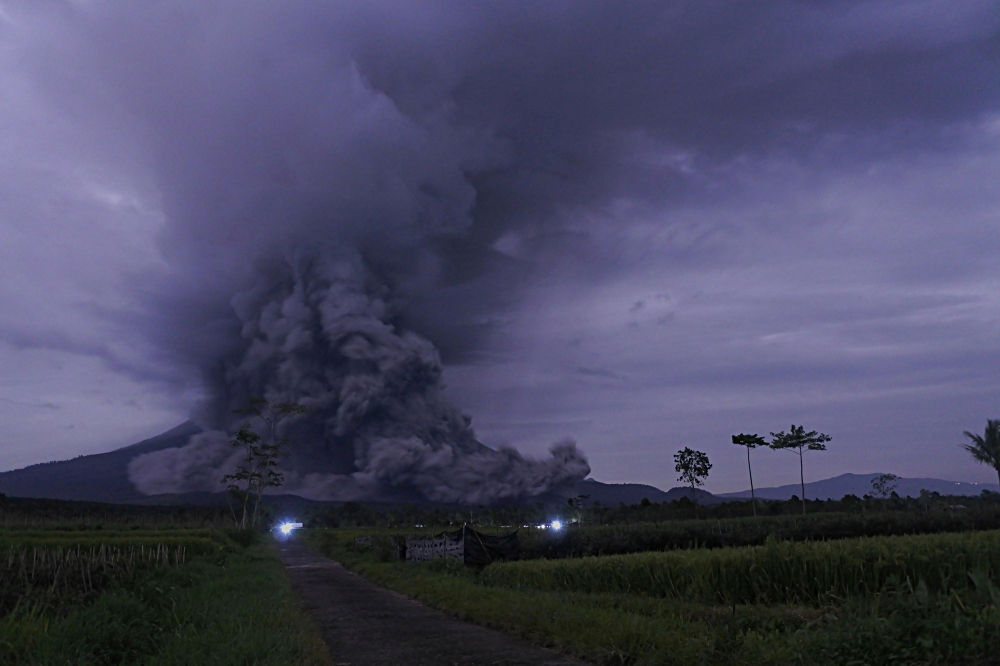 An eruption of Mount Semeru is seen in Lumajang, East Java Province, Indonesia, December 1, 2020, in this photo taken by Antara Foto/Seno via Reuters
