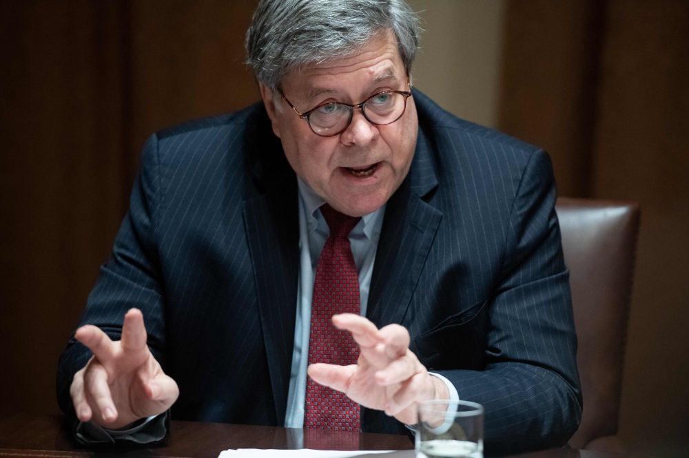 (FILES) In this file photo taken on June 15, 2020, US Attorney General Bill Barr speaks during a roundtable meeting on seniors with US President Donald Trump in the Cabinet Room at the White House in Washington, DC. AFP / Saul Loeb 