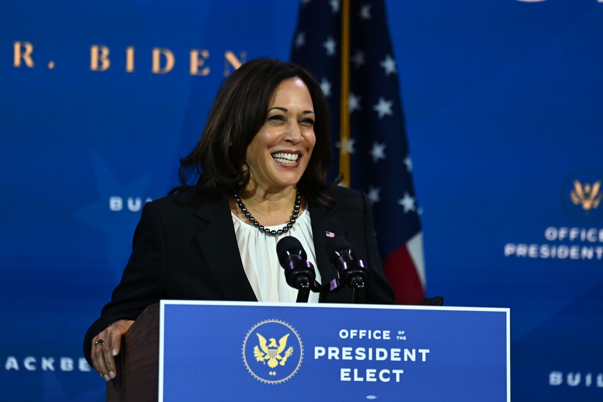 US Vice President-elect Kamala Harris speaks after US President-elect Joe Biden announced his economic team at The Queen Theatre in Wilmington, Delaware, on December 1, 2020. / AFP / Chandan KHANNA
