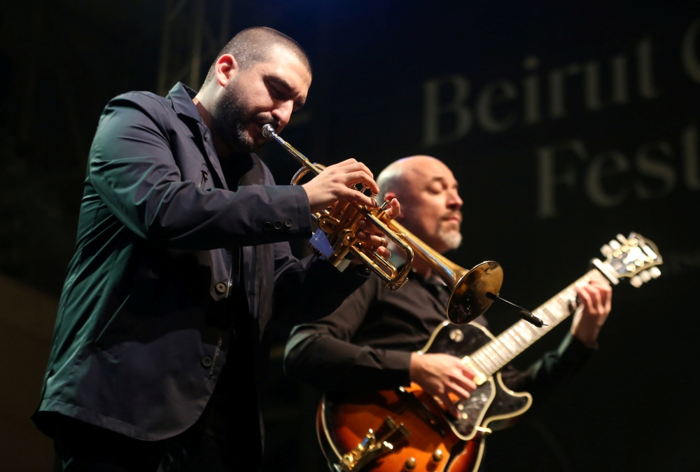 French-Lebanese trumpet player and composer Ibrahim Maalouf performs with guitarist Francois Delporte, as part of Beirut Chants Festival, in Beirut, Lebanon December 4, 2020. Reuters/Issam Abdallah