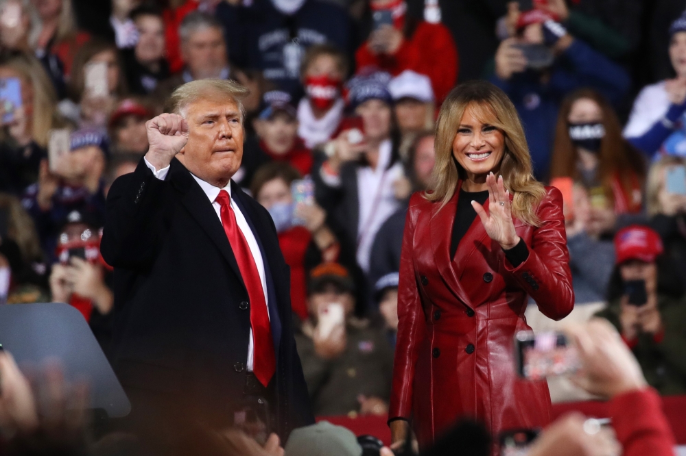 President Donald Trump and first lady Melania attend a rally in support of Sen. David Perdue (R-GA) and Sen. Kelly Loeffler (R-GA) on December 05, 2020, in Valdosta, Georgia. Spencer Platt/Getty Images/AFP