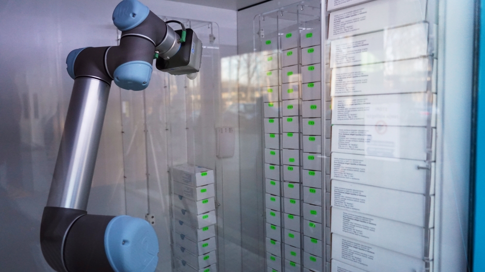 A robotic arm is seen inside a vending machine where people can pick up coronavirus disease (COVID-19) saliva-based tests and return samples without having to come into contact with others, in Riga, Latvia December 9, 2020. Picture taken December 9, 2020.