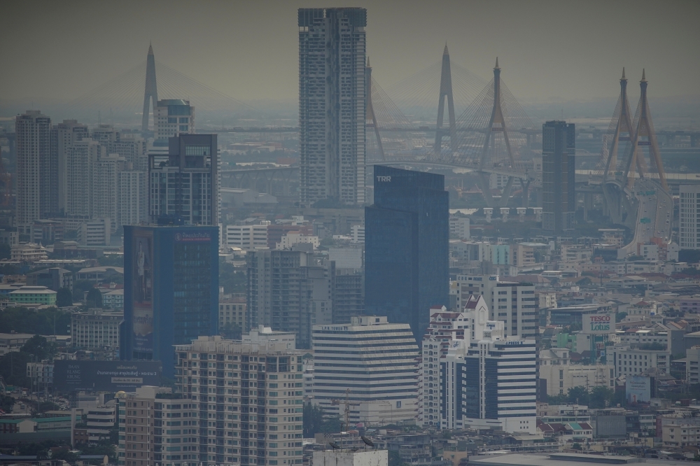 Buildings are shrouded in haze in Bangkok, Thailand December 15, 2020. REUTERS/Athit Perawongmetha