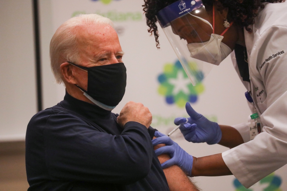 U.S. President-elect Joe Biden receives a dose of a vaccine against the coronavirus disease (COVID-19) at ChristianaCare Christiana Hospital, in Newark, Delaware, U.S. December 21, 2020. REUTERS/Leah Millis