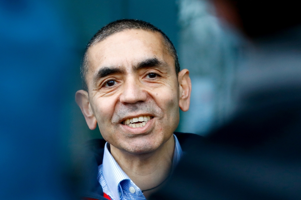 CEO and co-founder of BioNTech, Ugur Sahin, answers journalists' questions after the European Medicines Agency (EMA) approved its COVID-19 vaccine, at the company headquarters in Mainz, Germany December 22, 2020. REUTERS/Ralph Orlowski