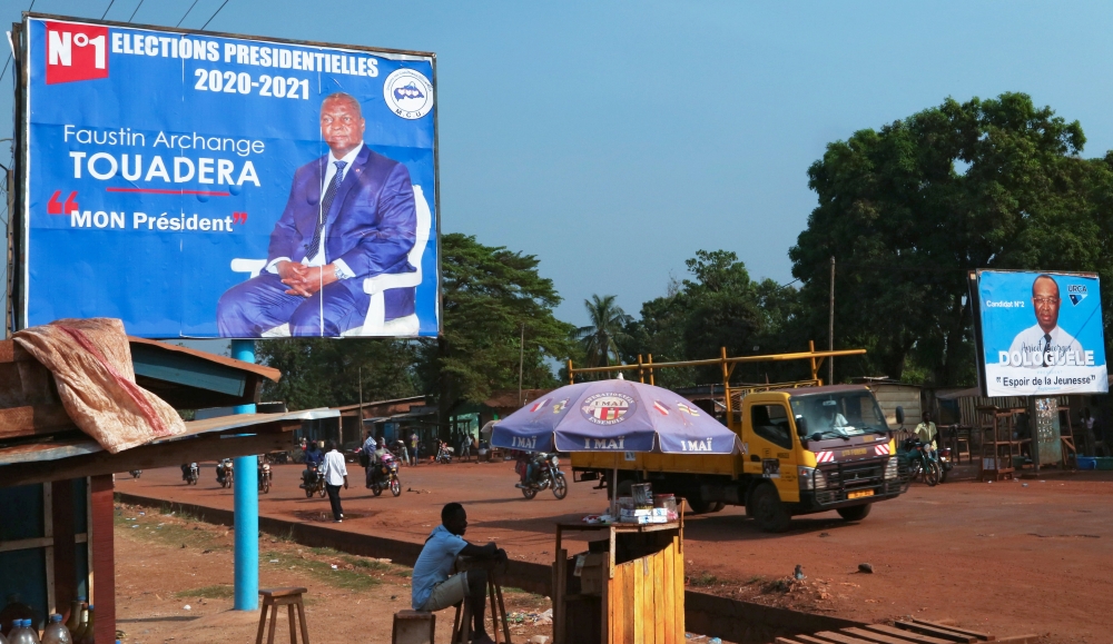A campaign billboard of Central African Republic President Faustin Archange Touadera has seen the streets ahead of the upcoming elections in Bangui, the Central African Republic December 26, 2020. REUTERS/Antonie Rolland 