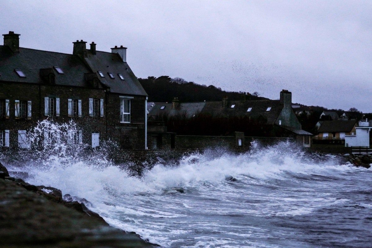 High waves and strong winds hit the coast of Le Becquet, northwestern France on December 27, 2020, as storm Bella strikes the coast of Britanny and Normandy. / AFP / Sameer Al-DOUMY
