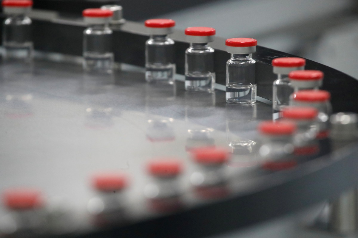 FILE PHOTO: A view shows vials during the production of Gam-COVID-Vac, also known as Sputnik-V, vaccine against the coronavirus disease (COVID-19) at a facility of BIOCAD biotechnology company in Saint Petersburg, Russia December 4, 2020. Picture taken De
