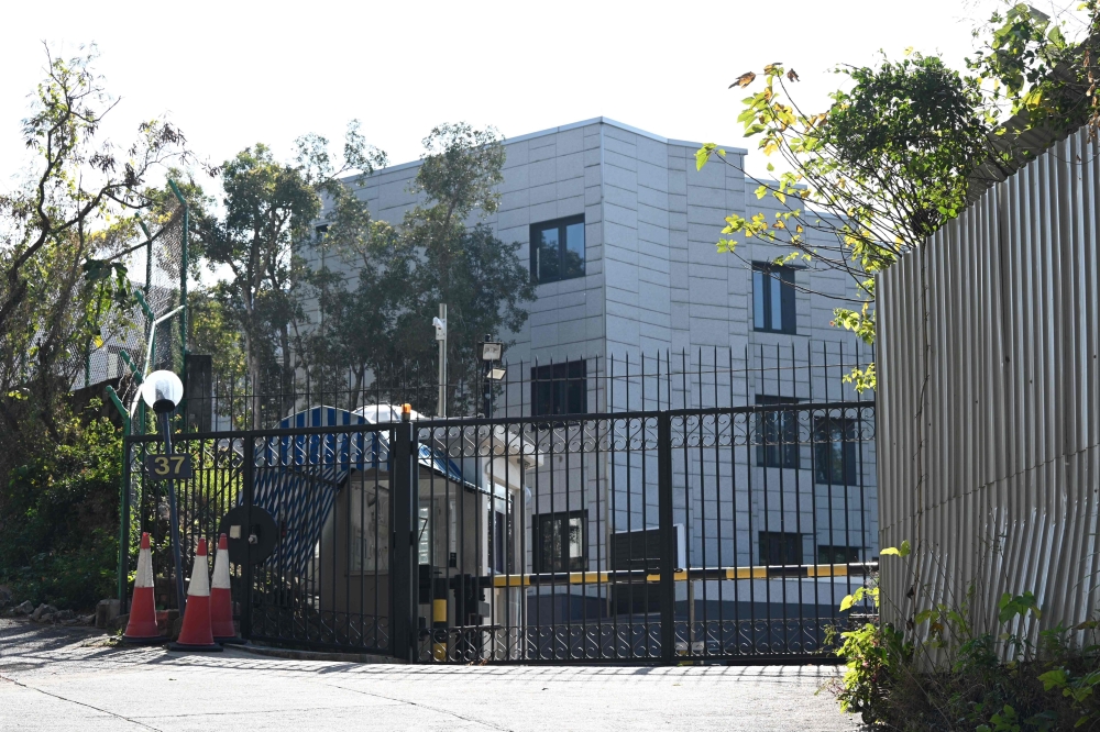 This general view shows the outside of 37 Shouson Hill Road in southern Hong Kong on December 30, 2020, part of a multibillion-dollar property of six mansions owned by the US Consulate General in the city. / AFP / Peter Parks