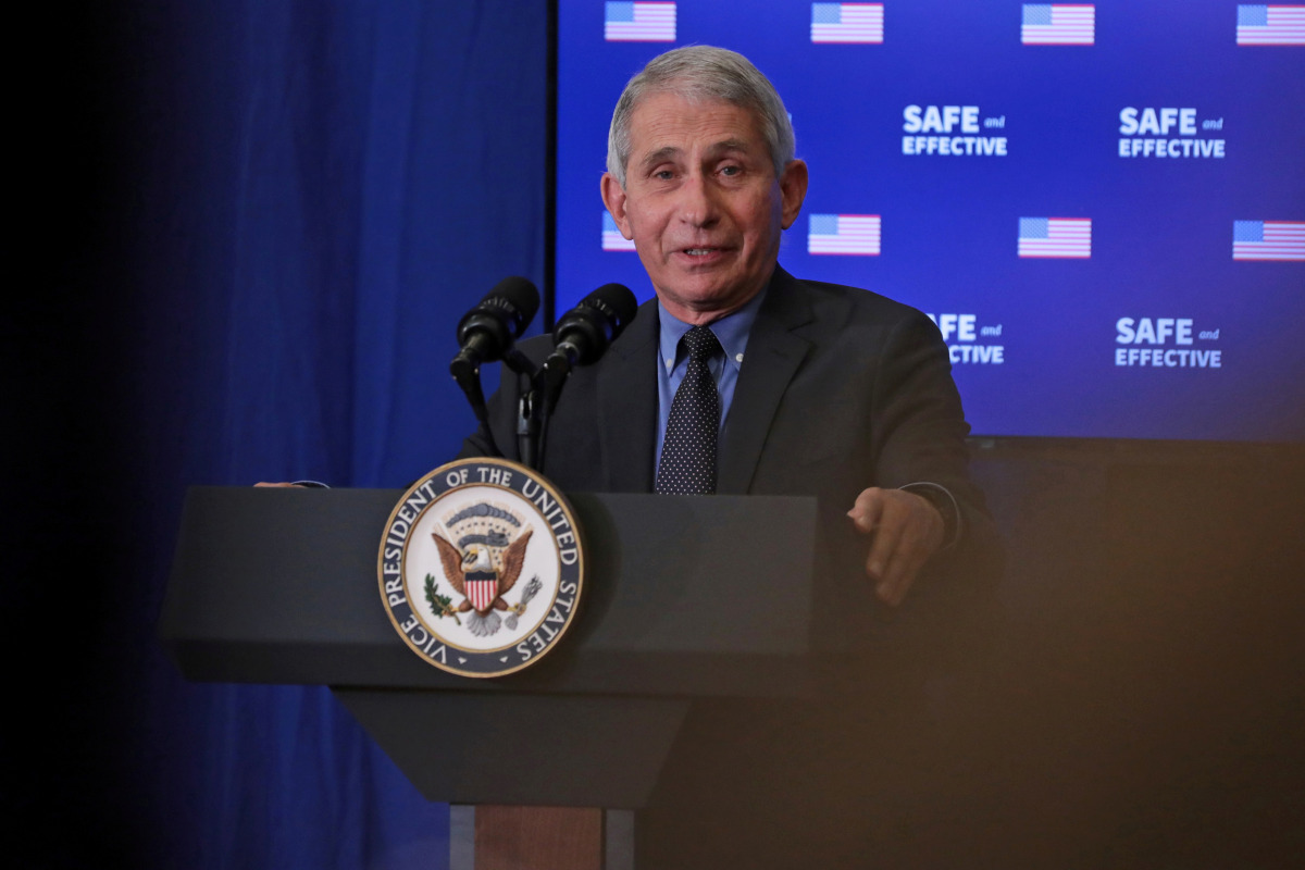 FILE PHOTO: Dr. Anthony Fauci, director of the National Institute of Allergy and Infectious Diseases, speaks at an event where U.S. Vice President Mike Pence received the coronavirus disease (COVID-19) vaccine at the White House in Washington, U.S., Decem