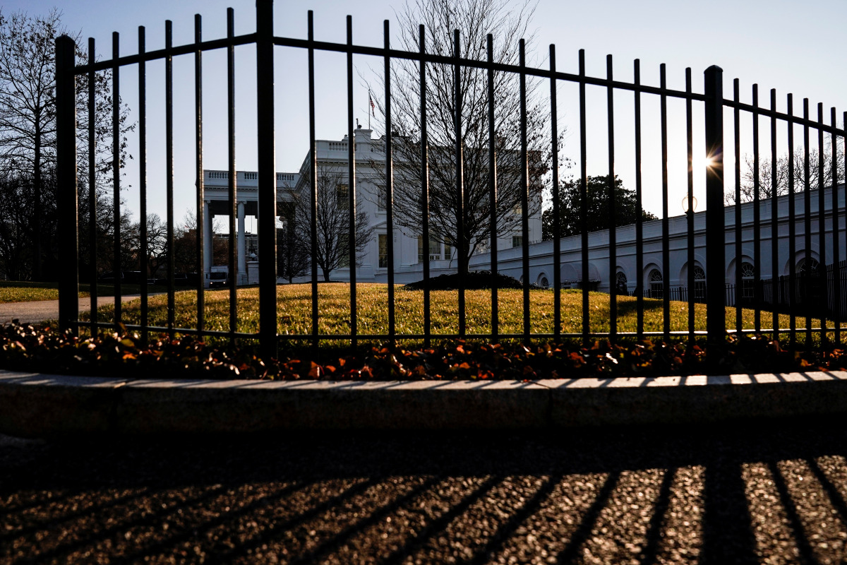 The sun rises over the White house in Washington, U.S., January 7, 2021. REUTERS/Joshua Roberts
