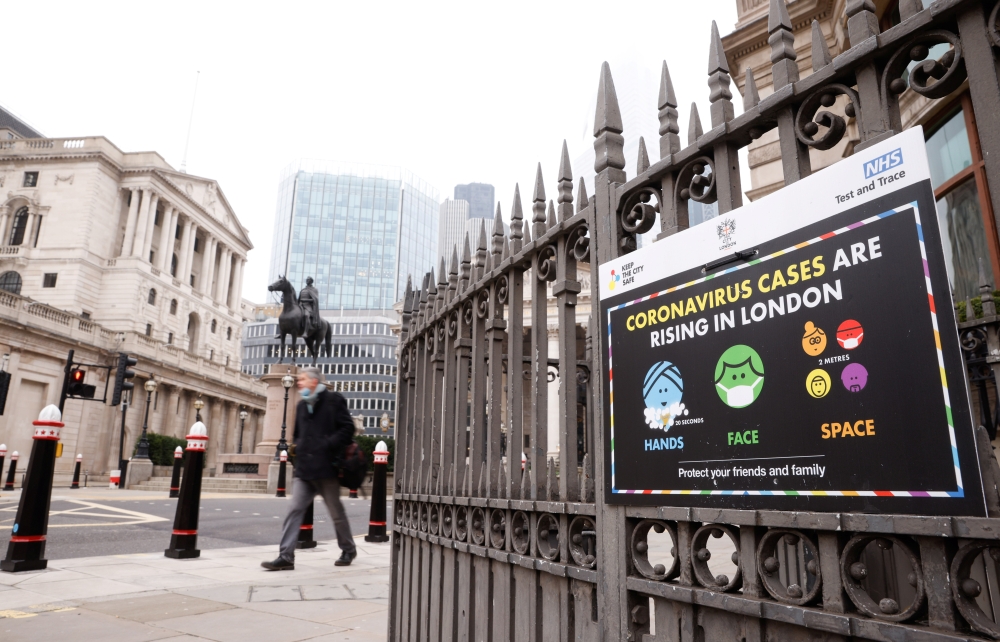An NHS sign is displayed outside the Bank of England in the financial district, as the spread of the coronavirus disease (COVID-19) continues, in London, Britain, January 8, 2021. REUTERS/John Sibley