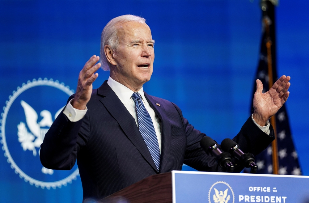 U.S. President-elect Joe Biden speaks as he announces his Justice Department nominees at his transition headquarters in Wilmington, Delaware, U.S., January 7, 2021. REUTERS/Kevin Lamarque