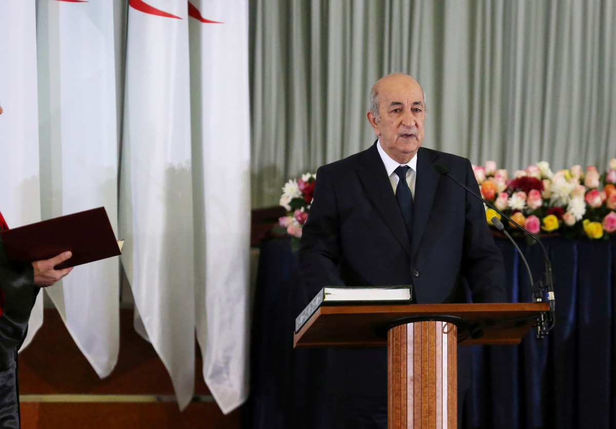 FILE PHOTO: Newly elected Algerian President Abdelmadjid Tebboune takes the oath during a swearing-in ceremony in Algiers, Algeria December 19, 2019. REUTERS/Ramzi Boudina/File Photo
