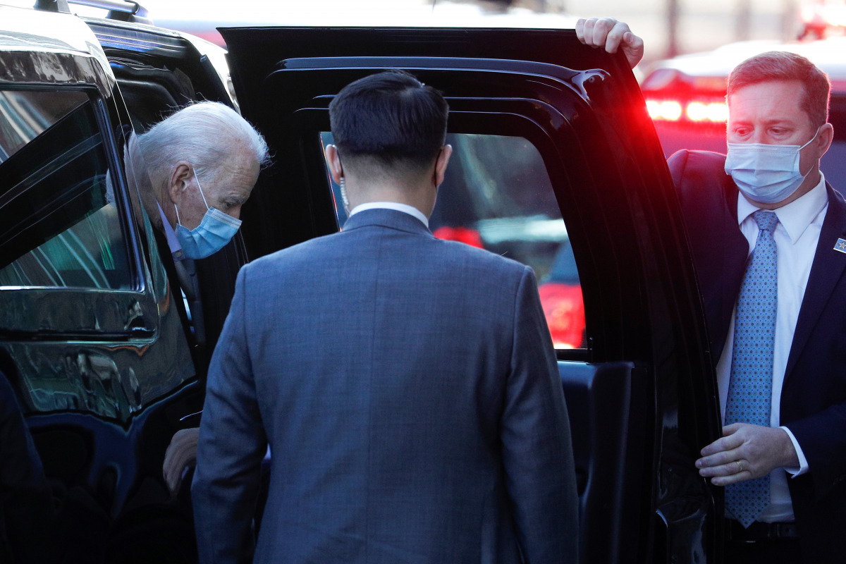 U.S. President-elect Joe Biden walks into the Queen Theatre in Wilmington, Delaware, U.S., January 10, 2021. REUTERS/Tom Brenner
