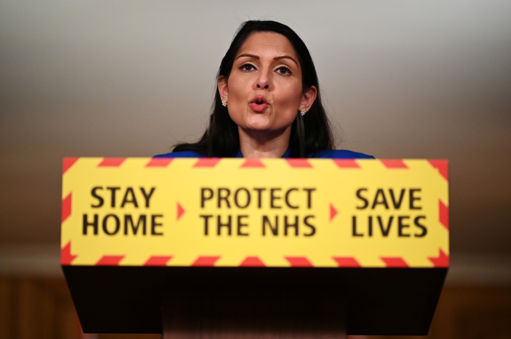 Britain's Home Secretary Priti Patel speaks at a coronavirus disease (COVID-19) related news conference at Downing Street, in London, Britain, January 12, 2021. Leon Neal/Pool via REUTERS