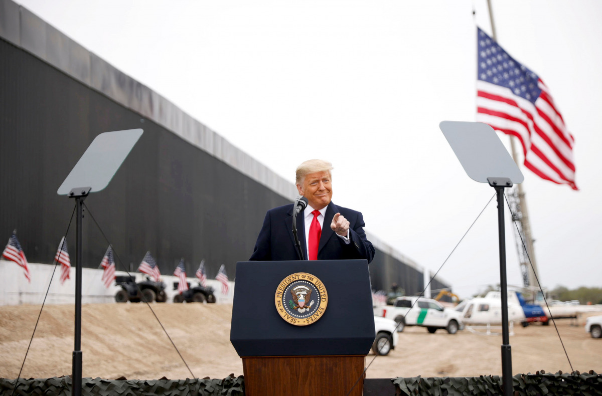 U.S. President Donald Trump gestures as he speaks during a visit at the U.S.-Mexico border wall, in Alamo, Texas, U.S., January 12, 2021. REUTERS/Carlos Barria
