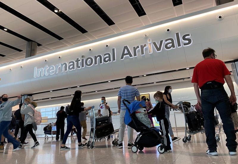 Passengers from international flights arrive at Heathrow Airport, following the outbreak of the coronavirus disease (COVID-19), London, Britain, July 29, 2020. REUTERS/ Toby Melville
