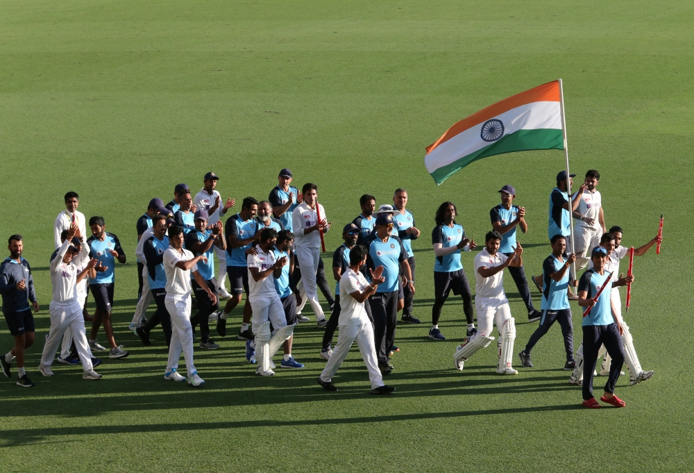 India celebrates winning on day five of the fourth test match between Australia and India at the Gabba in Brisbane, Australia, January 19, 2021. AAP Image/Darren England via REUTERS