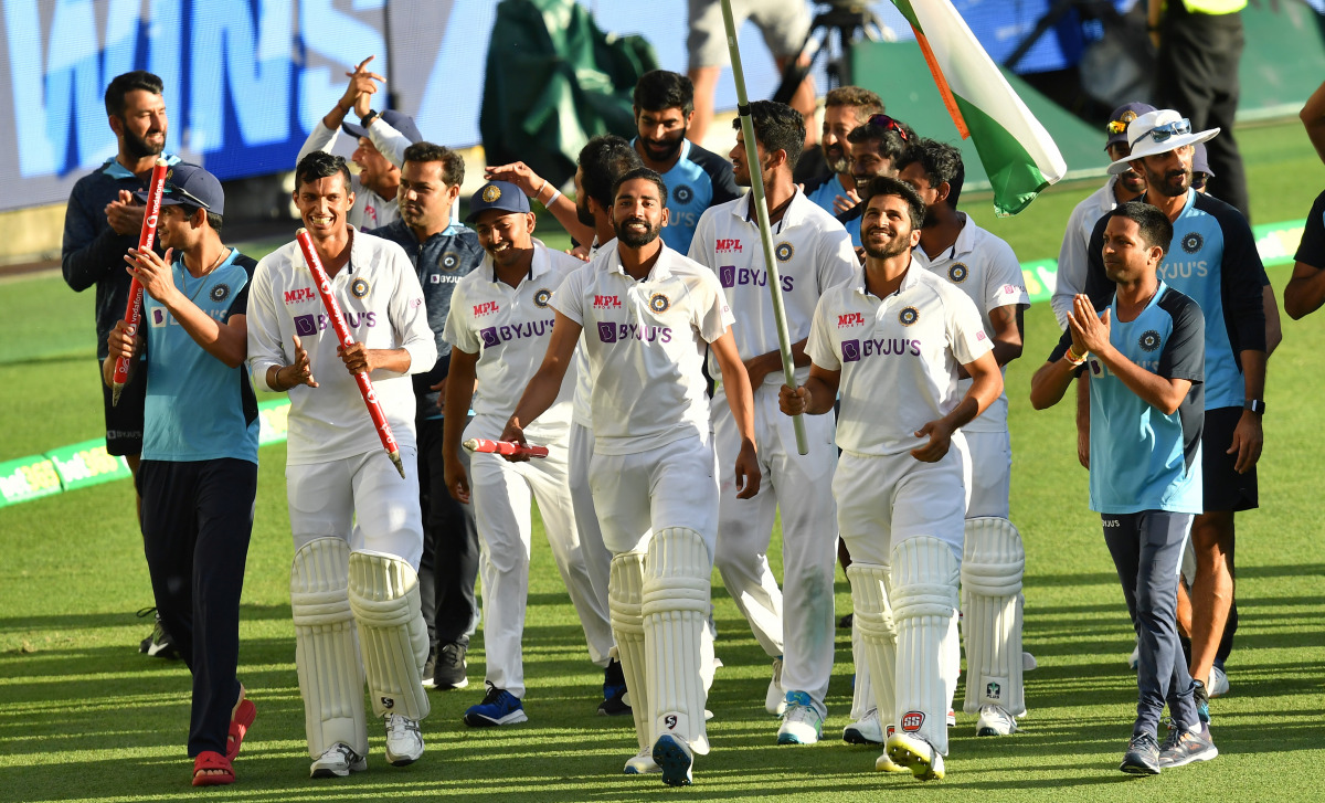India celebrates winning on day five of the fourth test match between Australia and India at the Gabba in Brisbane, Australia, January 19, 2021. AAP Image/Darren England via REUTERS 